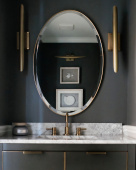 Золотое овальное зеркало “Хоган”